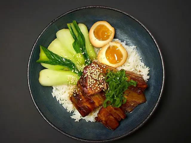 Pork Belly Bowl with braised pork belly, soy eggs, bok choy and jasmine rice